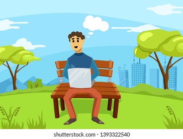 Young man is sitting on bench in the park and working on a new project. Work on nature and fresh air with laptop.