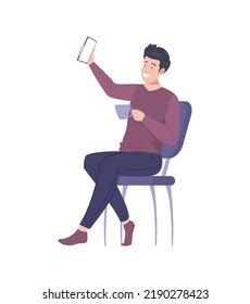 Young man sitting on chair and taking selfie using smartphone. Cheerful guy dressed casual outfit sitting with cup of tea smiling at camera. Stylish man with mobile phone flat vector