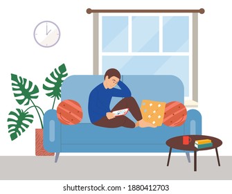 A young man sitting on the couch uses his tablet to get the information he needs. An image of a male character using modern technologies for self-education at home, communicates on social networks