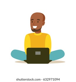 Young man sitting on the floor and using laptop. Colorful character vector Illustration