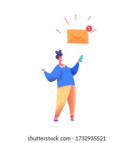 Young man with smartphone having new message notification with alarming envelope. Male designer or programmer. Freelancer working online from home sitting at floor.