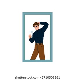 Junger Mann, der vor einem Spiegel steht, ein Selfie mit seinem Smartphone nimmt, während er posiert und sein Haar justiert, Selbstvertrauen und Selbstbewunderung zum Ausdruck bringt