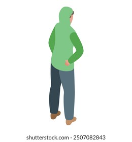 Young man is standing with his hand on his hip, wearing a green hoodie and jeans