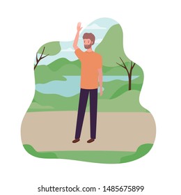 young man standing with landscape background