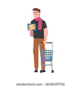 Young Man Standing with Small Shopping Cart, Guy Shopping for Groceries at Mall or Supermarket Cartoon Style Vector Illustration on White Background