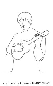 young man stands with a ukulele and plays. one line drawing of a man playing music on a small guitar