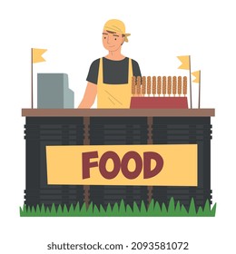 Young Man as Street Food Vendor Standing at Counter Vector Illustration