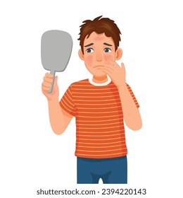 Young man suffering from facial sunburn on his face 