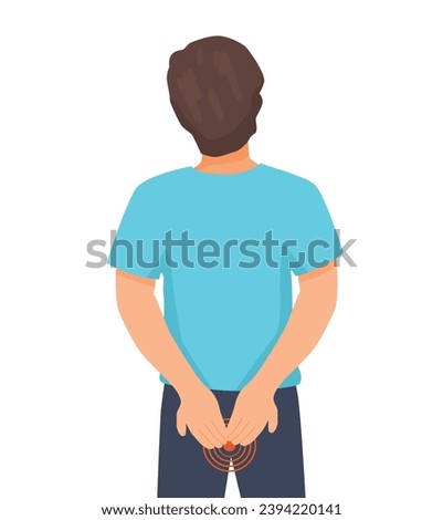 Young man suffering from hemorrhoids holding his bottom