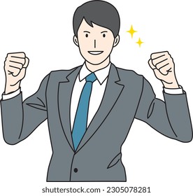 Young man in a suit in fist pump pose