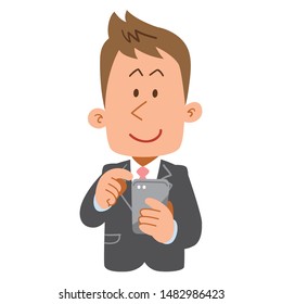 Young man in a suit operating a smartphone