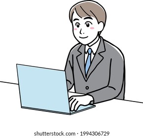 A young man in suit using his laptop
