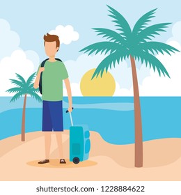 young man with suitcase on the beach