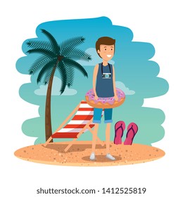 young man with swimsuit and float donut on the beach