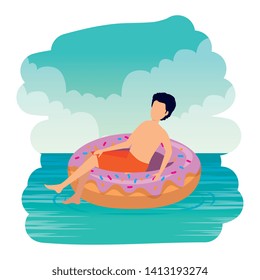 young man with swimsuit and float donut in the sea