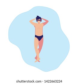 young man with swimsuit floating in water