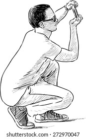 young man takes picture