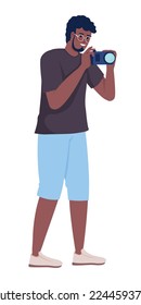 Young man taking pictures during trip semi flat color vector character. Editable figure. Full body person on white. Save moment simple cartoon style illustration for web graphic design and animation