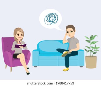 Young man talking about his problems to female psychologist