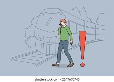 Young man talking on phone crossing tracks while train is approaching. Careless guy speak on cellphone ignore railroad safety rules and warnings. Keep back from platform edge. Vector.