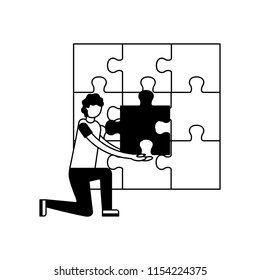young man and team work with puzzle pieces