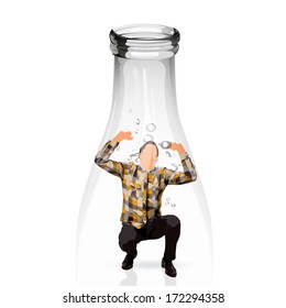 young man trapped into a water glass bottle
