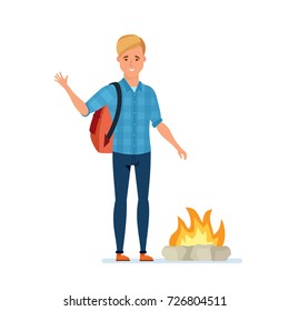 Young man traveler lights a fire. Healthy lifestyle, outdoor activities. Illustration in cartoon style.