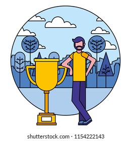 young man with trophy in landscape