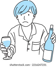 Young man with troubled face holding wine bottle and wine glass