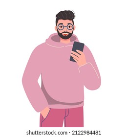Un joven usa un smartphone, habla y escribe por teléfono, se toma un selfie. Video chat, envío de SMS. Ilustración de dibujos animados planos vectores.