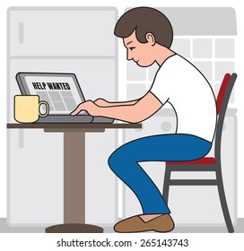 Young man using his laptop in his kitchen to find employment