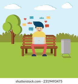 A young man using laptop outdoor sitting at a bench and surfing internet
