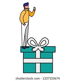 young man using smartphone with gift