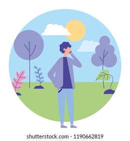 young man using smartphone in the nature landscape
