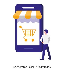 young man using smartphone with shopping cart