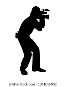 Young man with video camera silhouette vector