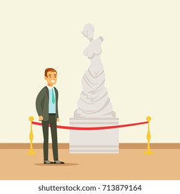 Young man viewing antique statue at the museum exhibition, people attending museum art gallery