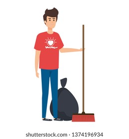 young man volunteer with garbage bag and broom