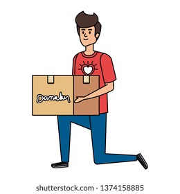 young man volunteer lifting donations box