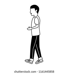 Young man walking in black and white