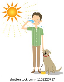 Young man walking with dogs while hydrating