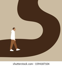 Young man walking on an empty road