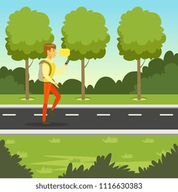 Young man walking in the park and using smartphone to texting messages, flat vector illustration