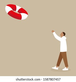 Young man wants to catch a lifebuoy