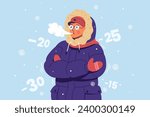 A young man in warm clothes, a hat and gloves is freezing and shivering from the cold. Freezing guy blows steam from his mouth. Cold weather.