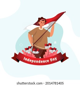 Un joven ondeando una bandera roja y blanca para celebrar el feliz día de la independencia indonesia