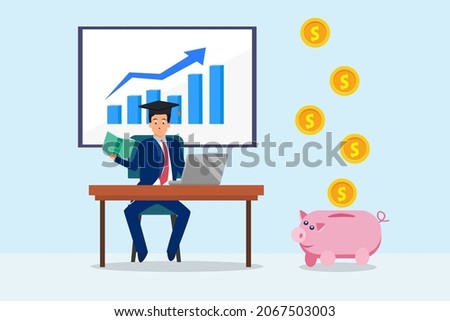 Young man wearing graduation cap while working with growth graph in the office near money falling into piggy bank