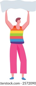 Young man wearing rainbow striped t shirt and pink pants holding blank banner supporting LGBTQ plus community at pride parade promoting equal rights and diversity