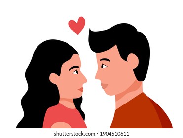 Young man and woman fall in love. Loving couple with heart shape on background. Romance dating. Valentine’s Day concept.
