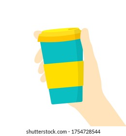 Young man woman hand holding reusable travel coffee cup mug of turquoise color with yellow lid non slip sleeve. Plastic free zero waste nature friendly concept